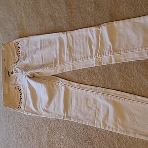 American Eagle Size 4 White Stretch Jeans with Studded Pockets